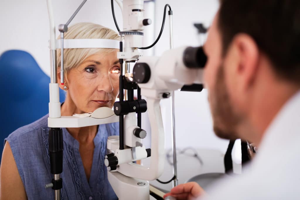 Woman receiving eye exam